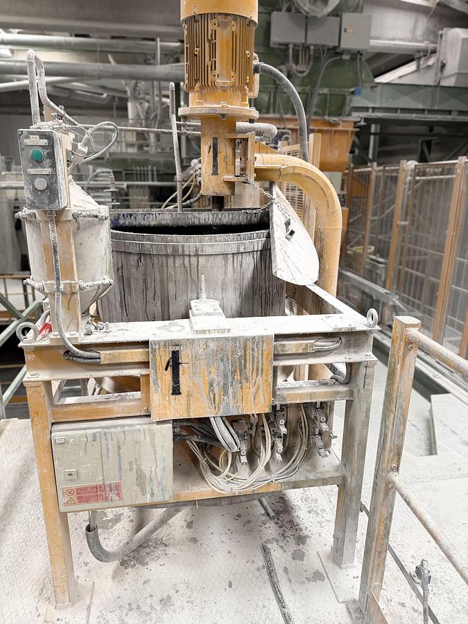 Impianto Breton formatura blocchi marmo agglomerato