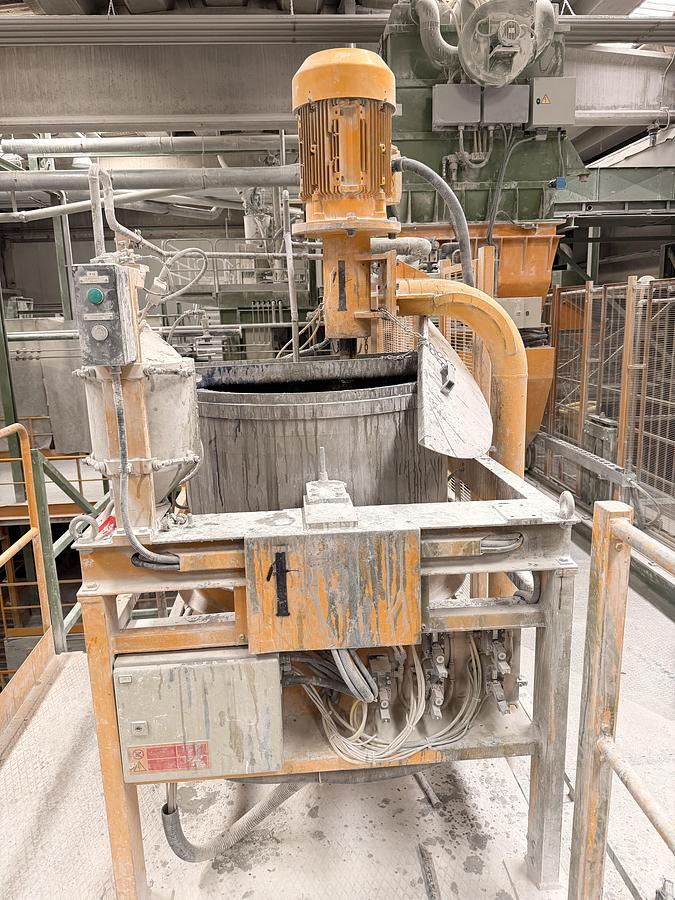 Impianto Breton formatura blocchi marmo agglomerato